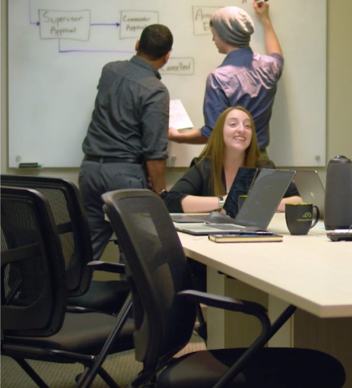 people in an office meeting room