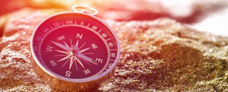 compass on a rock